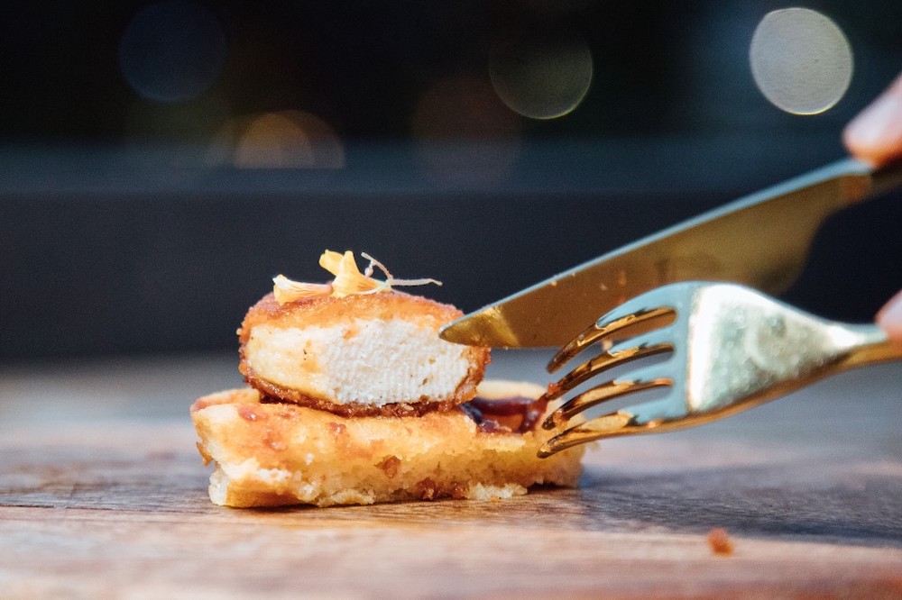This undated handout from Eat Just released on December 19, 2020 shows a nugget made from lab-grown chicken meat at a restaurant in Singapore, which became the first country to allow meat created without slaughtering any animals to be sold. ― AFP pic
