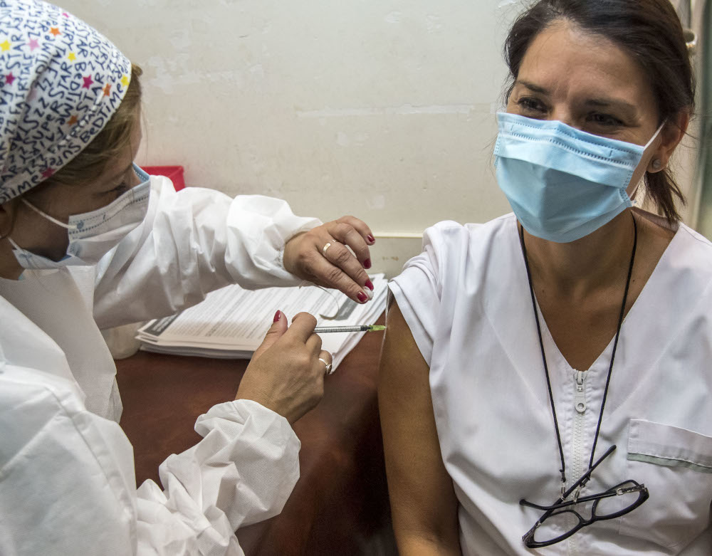 A health worker gets the Sputnik V vaccine at the Centenario Hospital in Rosario, Santa Fe Province, in Argentina, December 29, 2020. u00e2u20acu201d AFP pic 