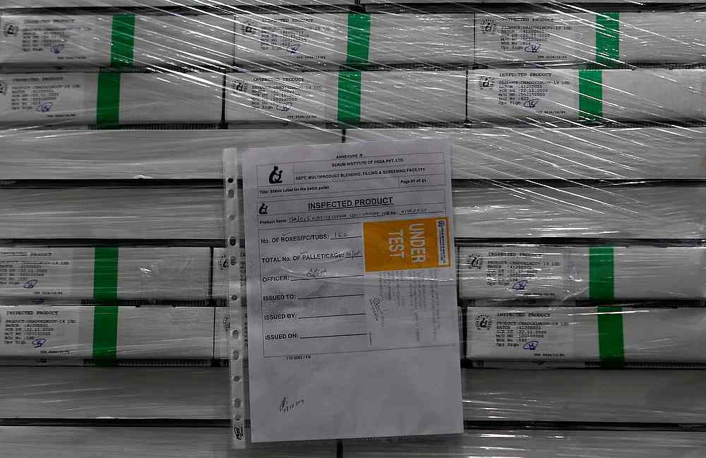 File photo of boxes containing the vials of AstraZeneca's Covishield, Covid-19 vaccine, are seen inside a cold room at the Serum Institute of India, in Pune, India 30 November 2020. — Reuters pic