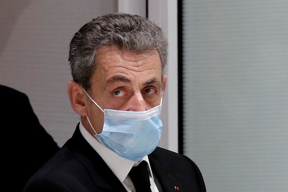 Former French President Nicolas Sarkozy leaves the courtroom during his trial on charges of corruption and influence peddling, at Paris courthouse, France December 7, 2020. u00e2u20acu201d Reuters pic