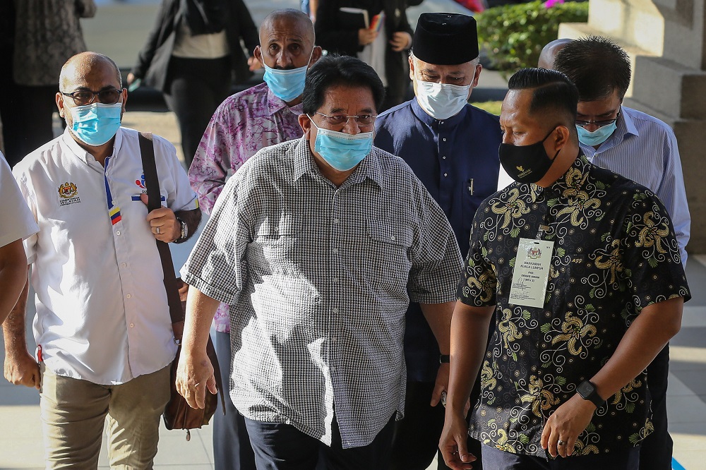 Former Federal Territories minister Datuk Seri Tengku Adnan Tengku Mansor arrives at the Kuala Lumpur Court Complex December 21, 2020. ― Picture by Yusof Mat Isa