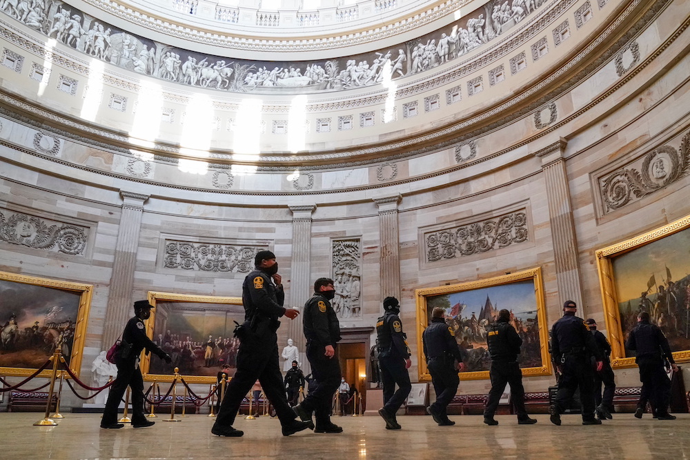 Virginia State Police and US Capitol Police walk inside the Rotunda of the US Capitol a day after supporters of US President Donald Trump occupied the Capitol in Washington, January 7, 2021. u00e2u20acu201d Reuters pic