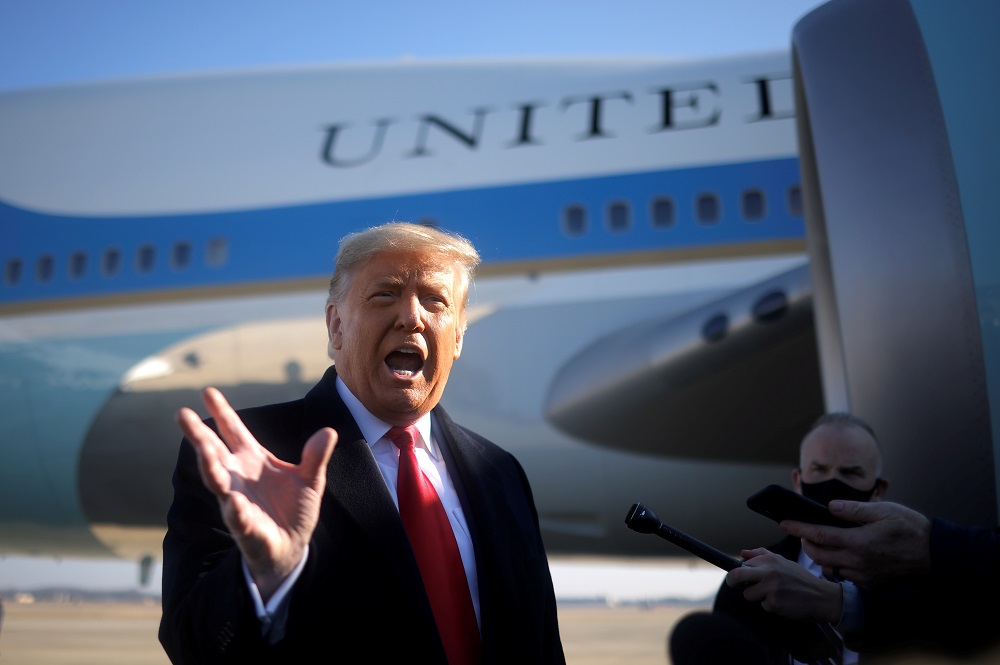 US President Donald Trump speaks to the media before boarding Air Force One to depart Washington on travel to visit the US-Mexico border Wall in Texas, at Joint Base Andrews in Maryland January 12, 2021. u00e2u20acu201d Reuters pic