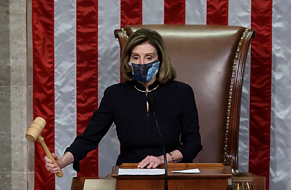 US House Speaker Nancy Pelosi presides over the vote to impeach President Donald Trump for a second time, on the floor of the House of Representatives in Washington January 13, 2021. u00e2u20acu201d Reuters pic