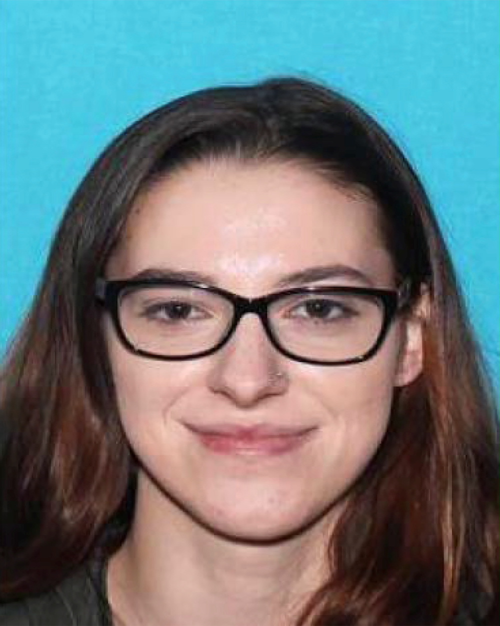 A woman identified in a warrant logged January 17, 2021 by the Federal Bureau of Investigation (FBI) as Riley June Williams accused of unlawfully breaching the US Capitol building is seen in an undated driver's license photograph. u00e2u20acu201d FBI/Handout via Reut