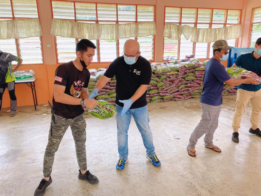 Harith said his team has successfully distributed aid to close to 2,000 Orang Asli families. u00e2u20acu201d Picture courtesy of The Hope Branch