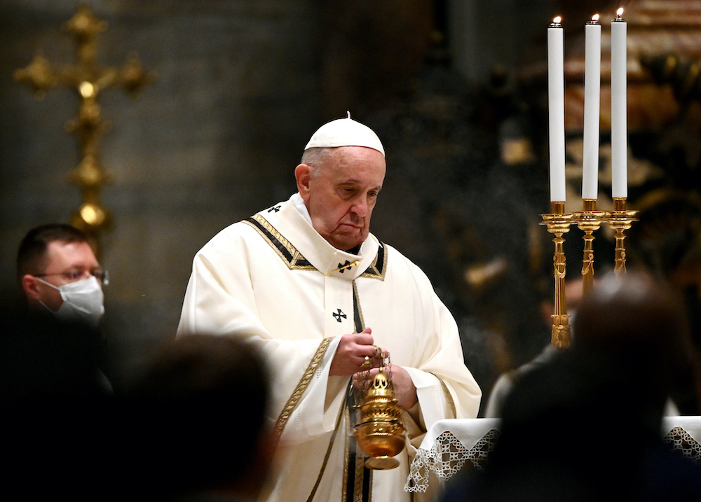 Pope Francis leads the Mass on Christmas Eve in St. Peteru00e2u20acu2122s Basilica amid the coronavirus disease pandemic at the Vatican December 24, 2020. u00e2u20acu2022 Reuters picnnn