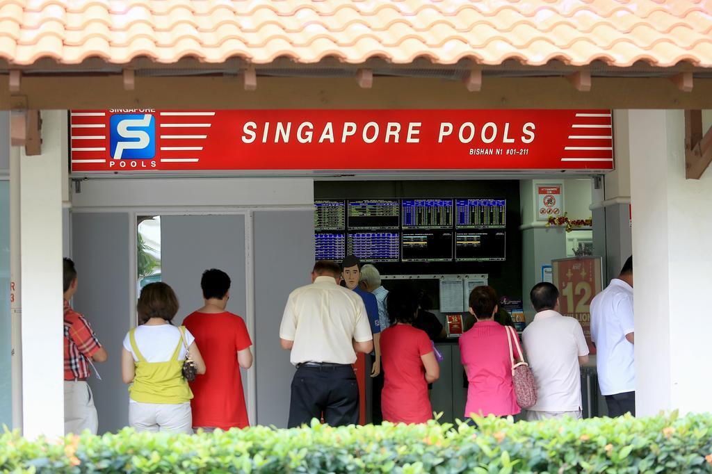 Voluntary screening for tuberculosis will be offered to former patrons who had spent prolonged durations at the Bedok betting centre to watch live horse-racing telecasts between 2018 and March 25, 2020. u00e2u20acu2022 TODAY file pic