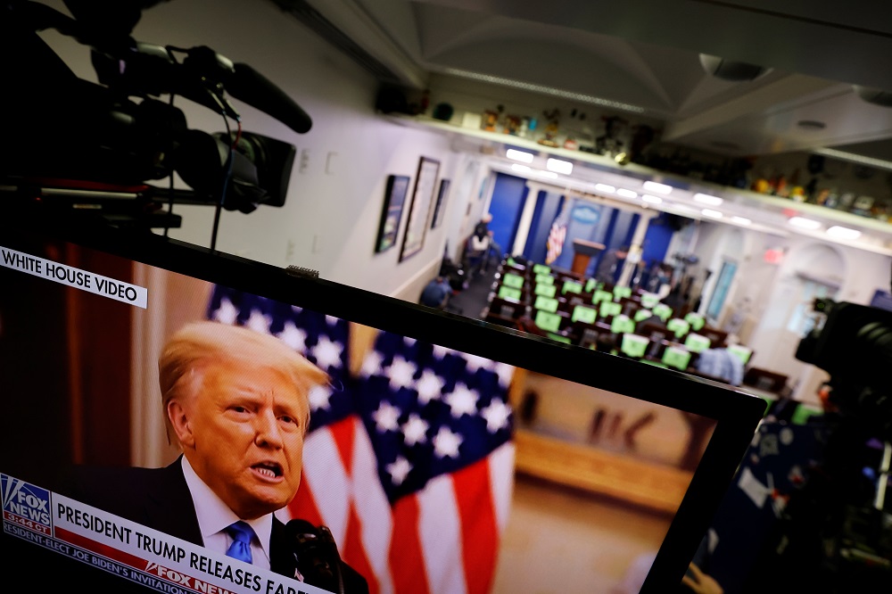 US President Donald Trump makes remarks on a television monitor from the White House Briefing Room during his last day in office, in Washington January 20, 2021. u00e2u20acu2022 Reuters pic