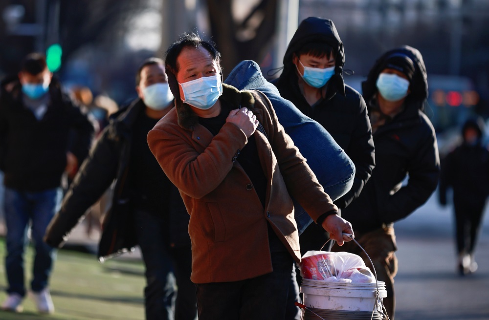 People wear face masks on a cold winter day following an outbreak of the coronavirus disease in Beijing, China January 6, 2021. u00e2u20acu2022 Reuters pic