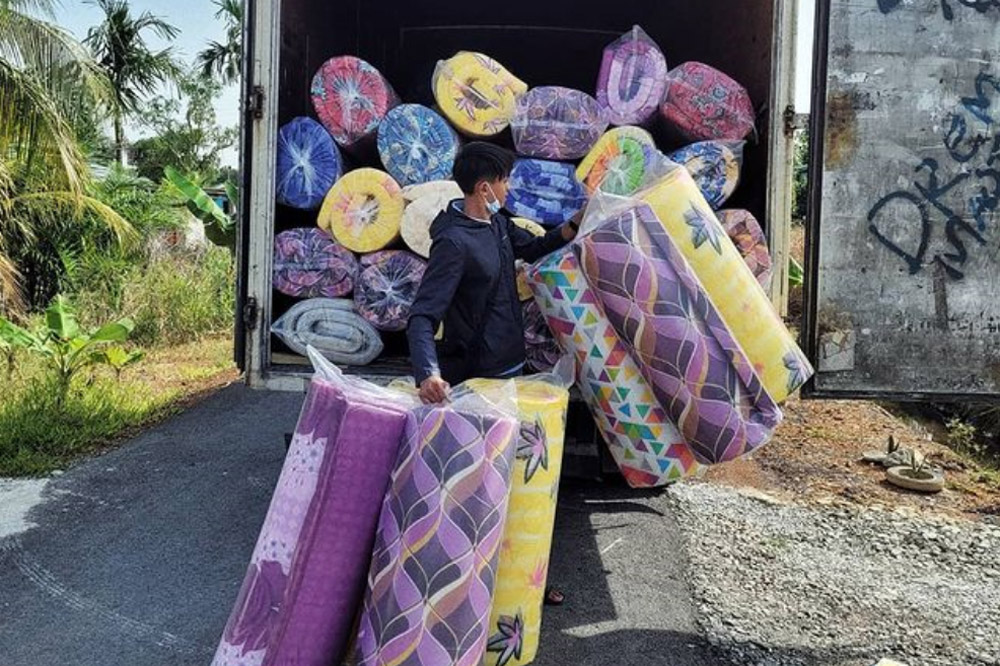 Mattresses and pillows for 87 families heavily affected by floods in Kuching.