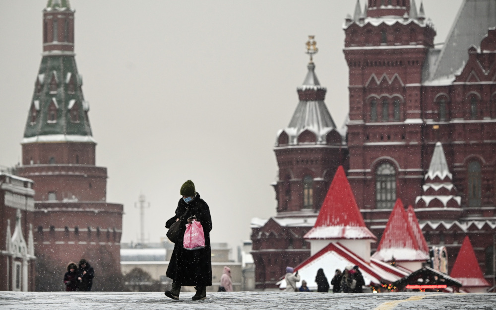 A woman wearing a face mask walks along Red Square in central Moscow January 12, 2021, amid the crisis linked with the Covid-19 pandemic caused by the novel coronavirus. u00e2u20acu201d AFP pic 