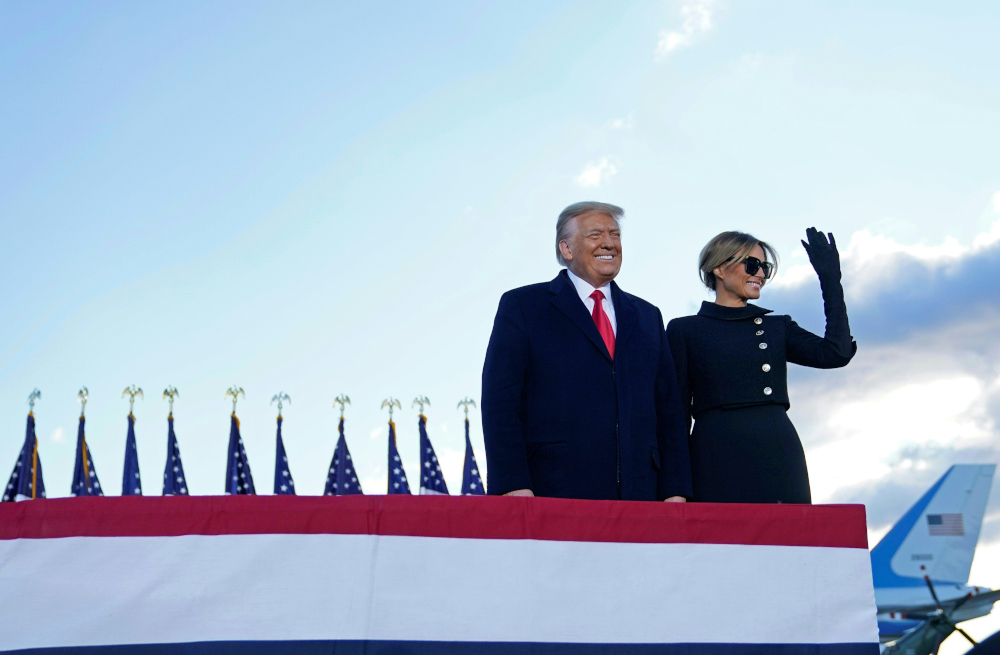 Outgoing US President Donald Trump and First Lady Melania Trump address guests at Joint Base Andrews in Maryland January 20, 2021. u00e2u20acu201d AFP pic 