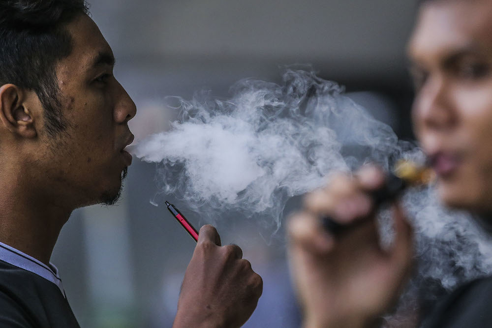 The government announced when tabling Budget 2021 that it would begin imposing excise duties on alternatives to cigarettes such as electronic cigarette devices and vape liquids. — Picture by Hari Anggara