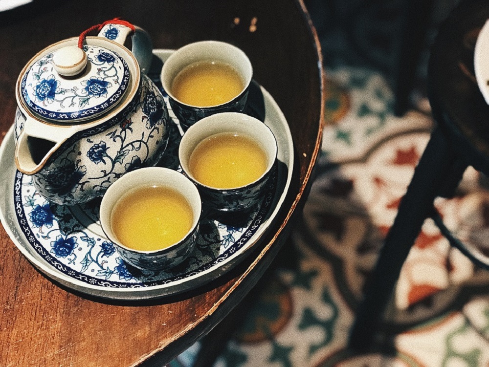 Serving tea to oneu00e2u20acu2122s parents and grandparents while offering well wishes is a custom observed on the first day of Chinese New Year. u00e2u20acu201d Picture from Unsplash