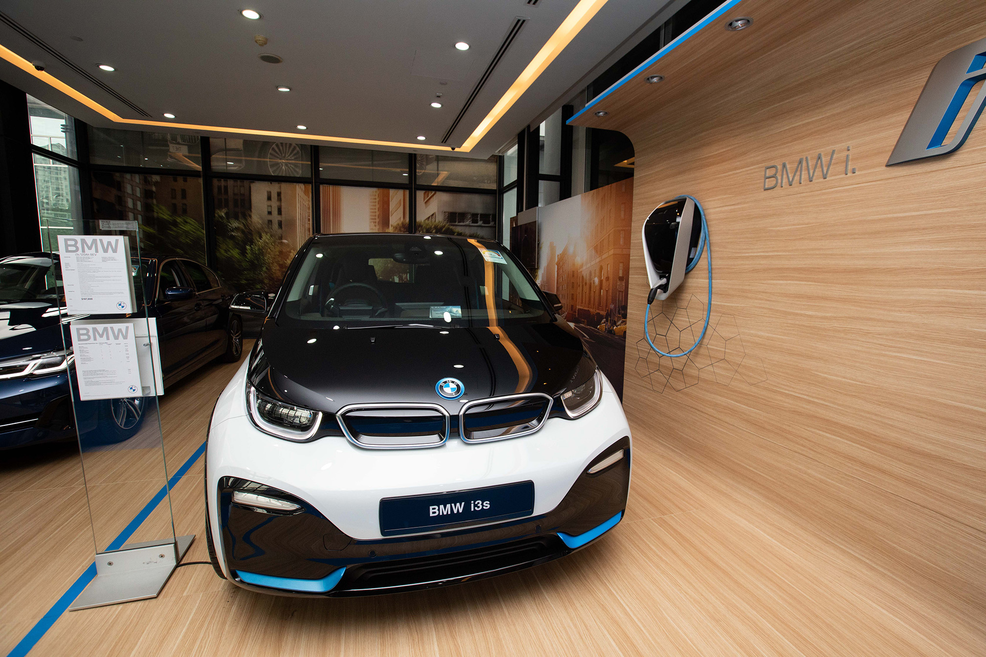 A BMW i3s electric vehicle displayed in a showroom. The case for EVs had only strengthened over the past decade, with energy and transport experts pointing out that the cost of batteries has been falling rapidly to a point where mass market EVs will be co