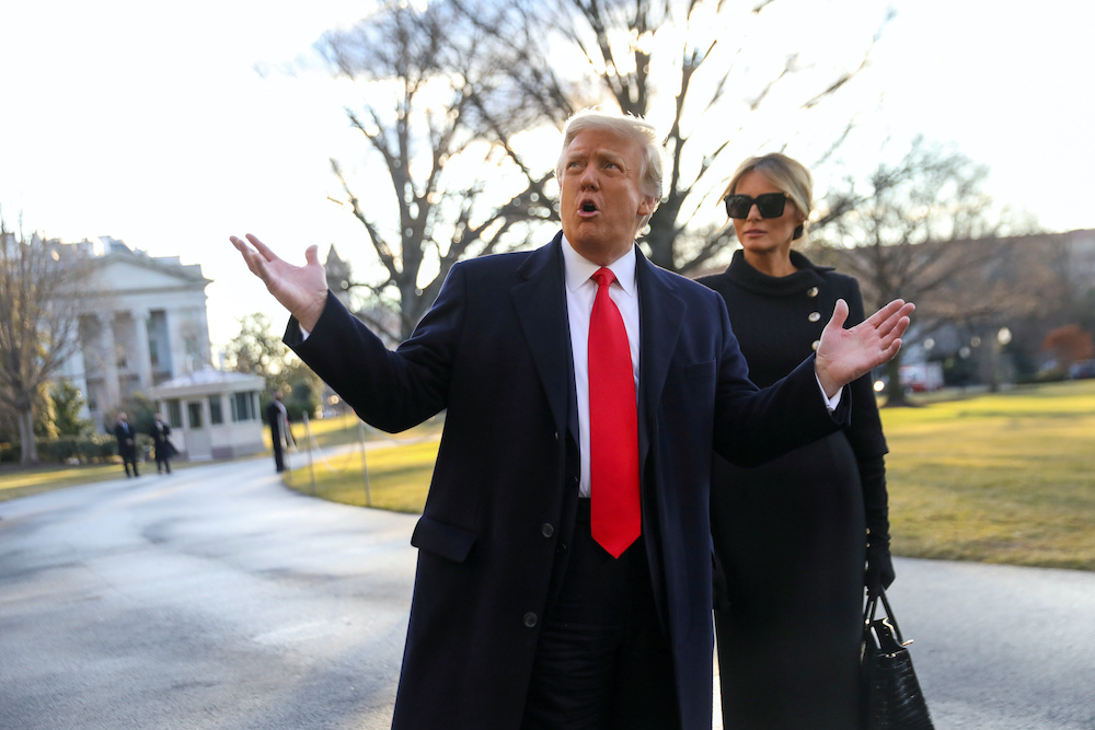US President Donald Trump gestures as he and first lady Melania Trump depart the White House to board Marine One ahead of the inauguration of president-elect Joe Biden, in Washington, US, January 20, 2021. u00e2u20acu201d Reuters picnnn
