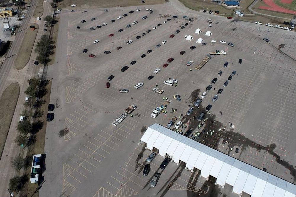 Cars line up to receive free cases of water after the city of Houston implemented a boil water advisory following an unprecedented winter storm, in an aerial photograph taken at Delmar Stadium in Houston, Texas, US, February 19, 2021. u00e2u20acu201d Reuters pic