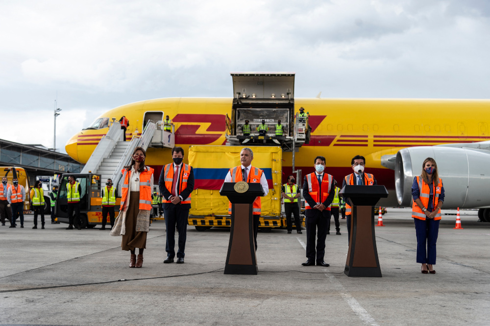 Colombiau00e2u20acu2122s President Ivan Duque (centre) delivering a speech upon the arrival of 50,000 doses of the Pfizer vaccine at El Dorado International Airport in Bogota February 15, 2021. u00e2u20acu201d Colombiau00e2u20acu2122s Presidency/Nicolas Galeano handout pic via AFP 