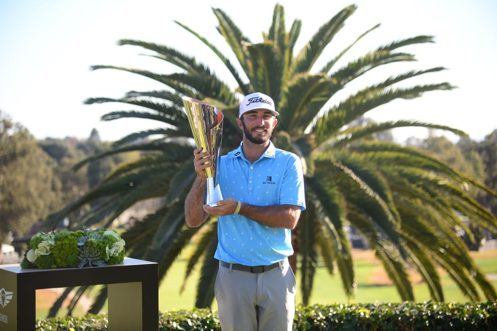 Max Homa poses with the winner's trophy following his playoff victory in the final round of The Genesis Invitational golf tournament at Riviera Country Club, California February 21, 2021. u00e2u20acu201d Reuters pic