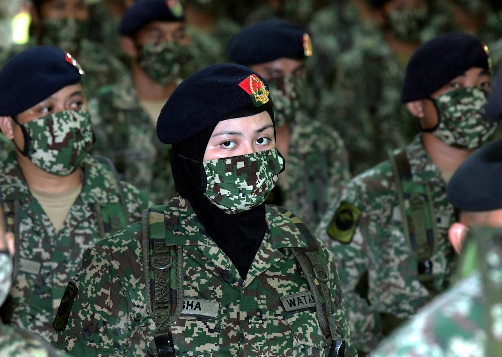 Members of the Territorial Army listen to a speech from Malaysian Third Infantry Brigade commander, Brigadier General Datuk Azhar Ahmad in Kuching, Sarawak, February 4, 2021. — Bernama pic