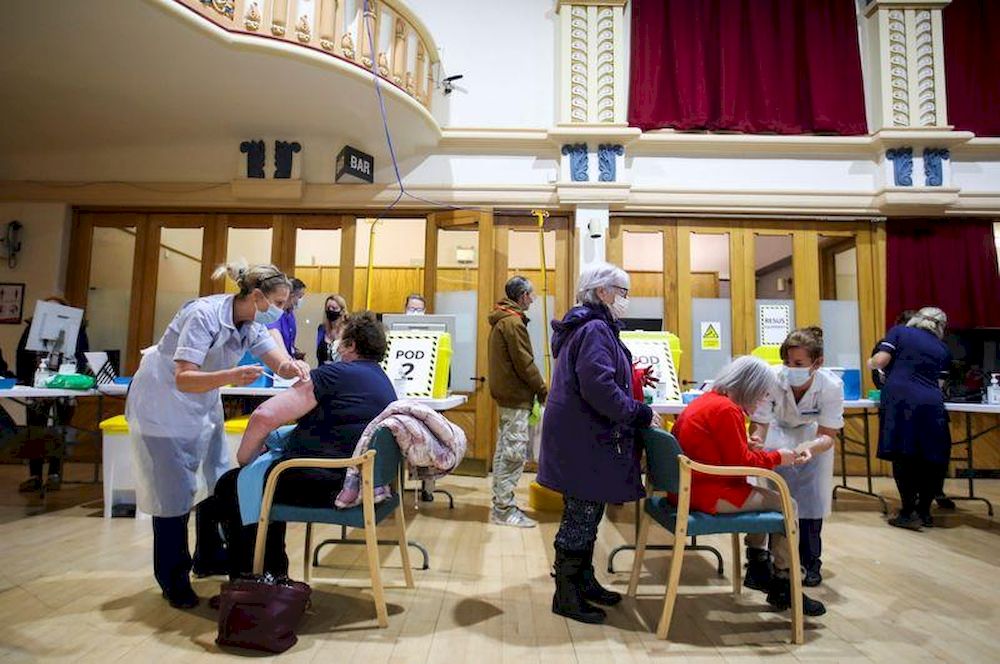 People wait to receive a vaccine against the coronavirus disease (Covid-19) in the Winding Wheel Theatre, Chesterfield, Britain February 3, 2021. u00e2u20acu201d Reuters pic