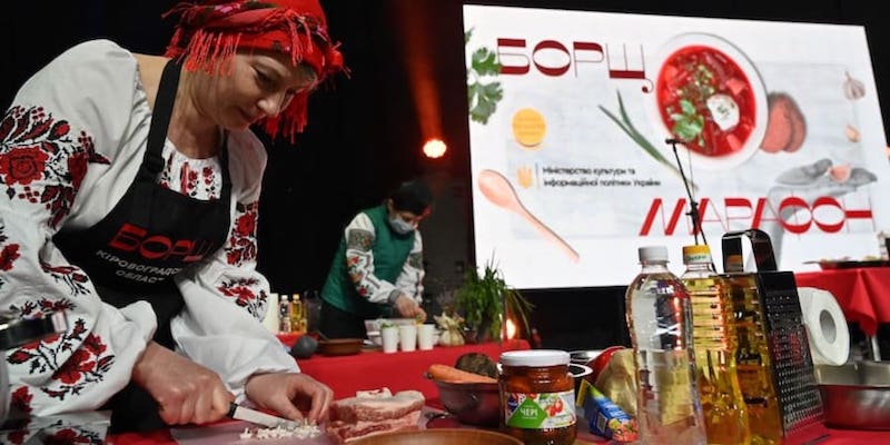 Participants cook borscht in Kiev on March 5, 2021, during an event to promote Unesco bid to recognise the traditional beetroot and cabbage dish as part of Ukraine's historical heritage. u00e2u20acu201d AFP pic