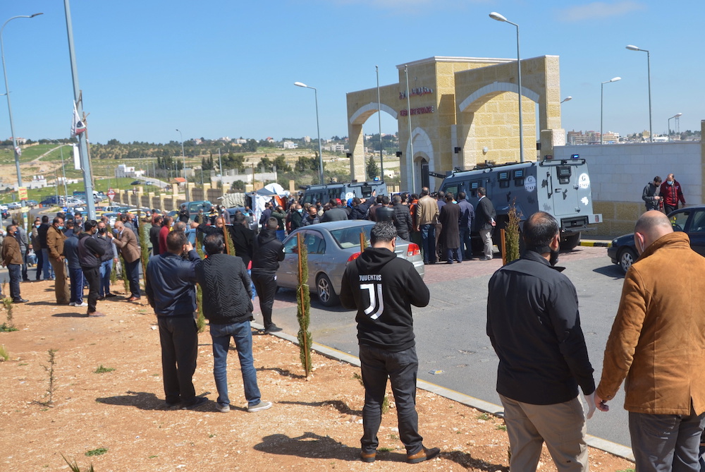 People gather outside the new Salt government hospital in the city of Salt, Jordan March 13, 2021. u00e2u20acu201d Reuters pic