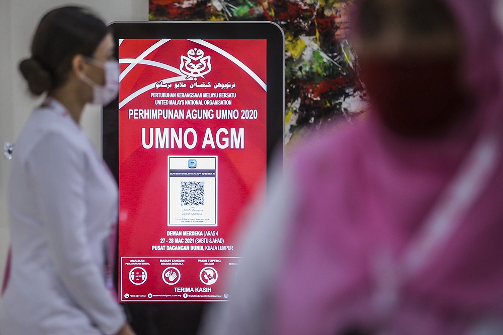 Puteri Umno members gather for the 2021 Umno annual general assembly in Kuala Lumpur March 27, 2021. ― Picture by Hari Anggara