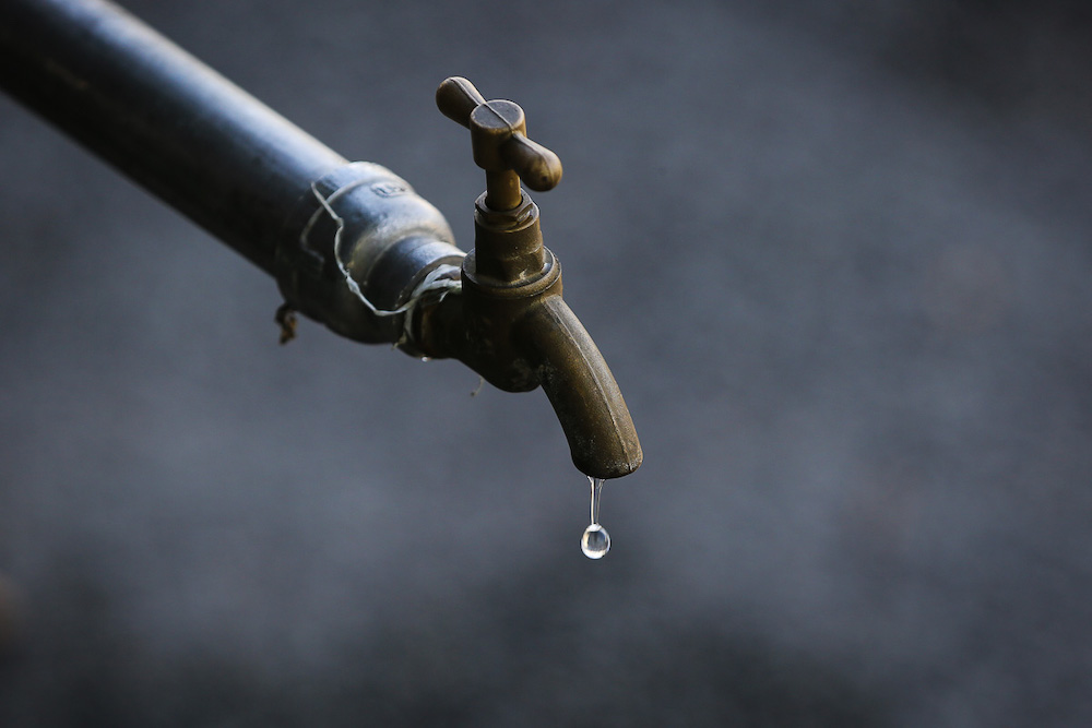 A drop of water is seen dropping from a tap in Shah Alam March 30, 2021. — Picture by Yusof Mat Isa