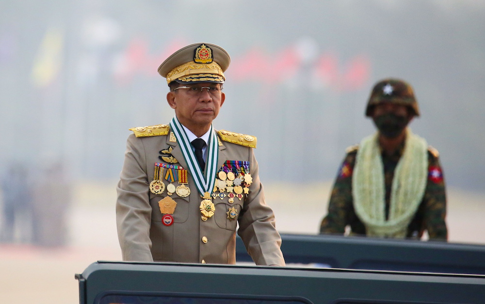 Myanmaru00e2u20acu2122s junta chief Senior General Min Aung Hlaing, who ousted the elected government in a coup on February 1, presides an army parade on Armed Forces Day in Naypyitaw, Myanmar, March 27, 2021. u00e2u20acu201d Reuters picnnn