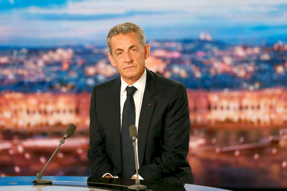 French former president Nicolas Sarkozy looks on as he is interviewed by journalist Gilles Bouleau (unseen) in the studio of French television channel TF1u00e2u20acu2122s evening news on March 3, 2021 in Boulogne Billancourt, on the outskirts of Paris. u00e2u20acu201d AFP pic