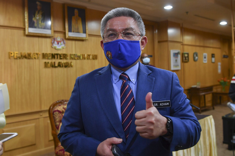 Health Minister Datuk Seri Dr Adham Baba during a press conference in the presence of Minister in the Prime Minister’s Department (Parliament and Law) Datuk Seri Takiyuddin Hassan at the Health Ministry March 3, 2021. — Bernama pic