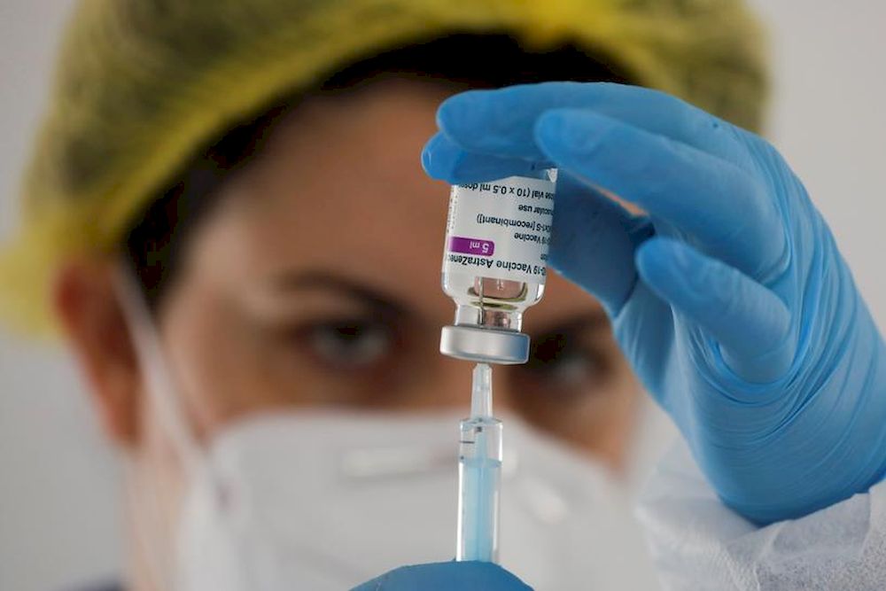 A healthcare worker prepares a dose of the AstraZeneca vaccine against the coronavirus disease (Covid-19) during a vaccination rollout for teachers in Ronda, Spain February 25, 2021. u00e2u20acu201d Reuters pic