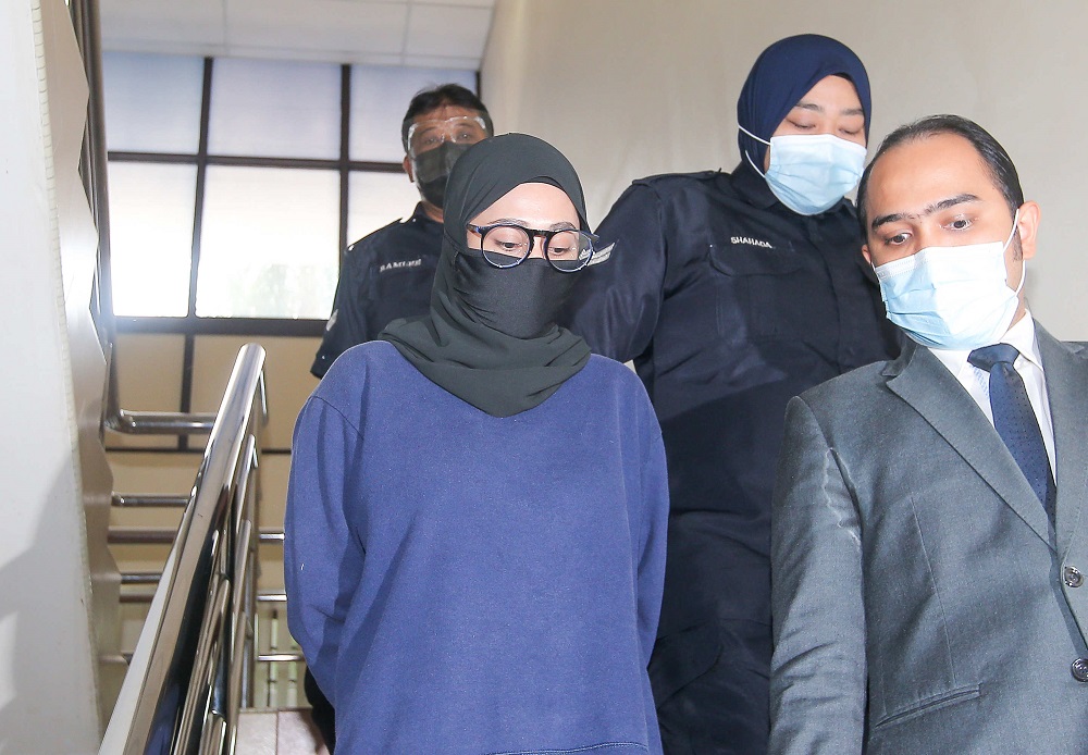 Siti Aisyah Mohamad Amir, a former human resource executive of a pharmaceutical company in Ipoh, was sentenced two months jail and fined a total of RM79,900.95 for making false salary claims. u00e2u20acu2022 Picture by Farhan Najib