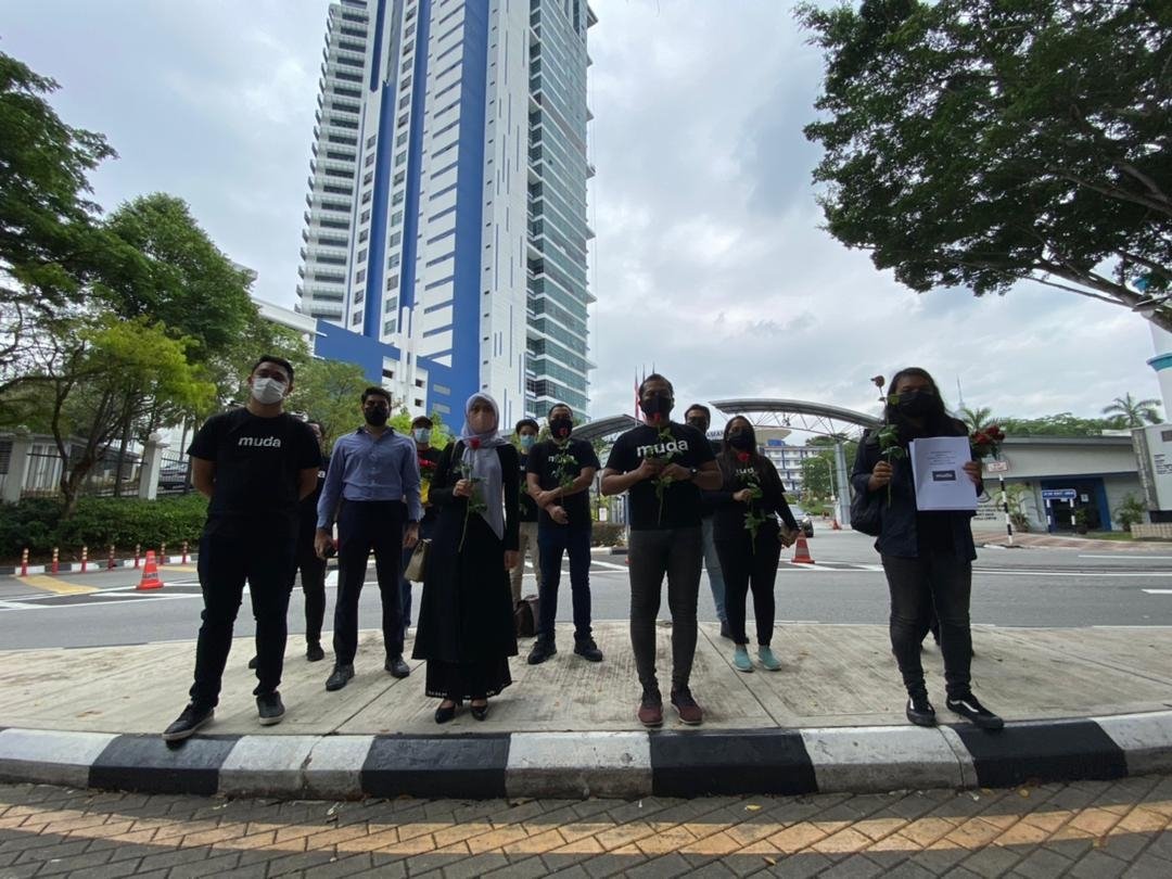 Members of the Malaysian United Democratic Alliance are pictured outside Bukit Aman, Kuala Lumpur March 23, 2021. — Picture via Twitter