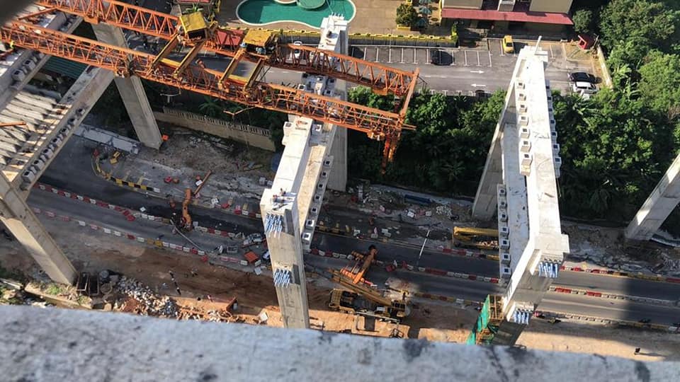 A view of the toppled crane at a construction site along the Sungai Besi-Ulu Kelang Elevated Expressway in Cheras March 22, 2021. — Picture via Facebook