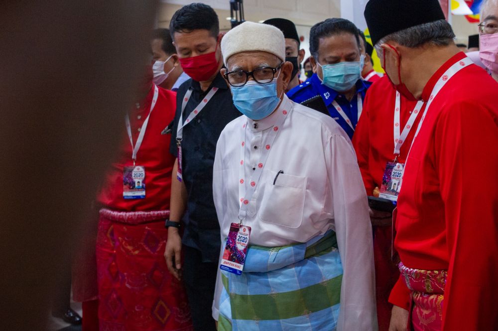 PAS president Datuk Seri Abdul Hadi Awang arrives for the 2020 Umno general assembly in Kuala Lumpur March 28, 2021. — Picture by Shafwan Zaidon