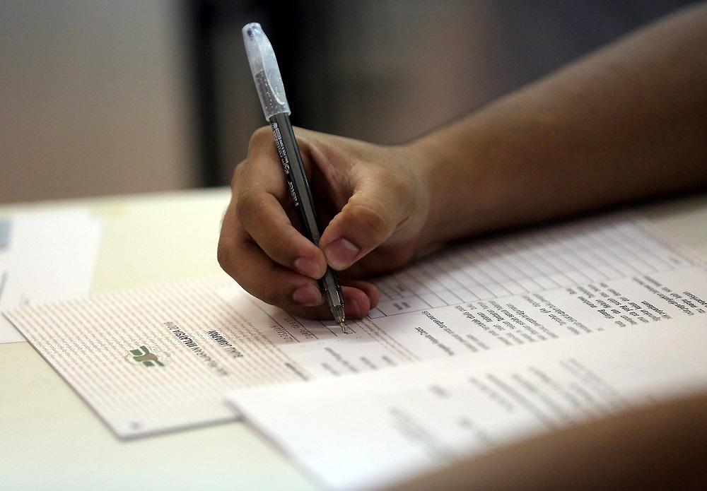 Malaysian man sits for SPM Chinese paper after skipping it multiple times over the past two decades.  u00e2u20acu201d  Picture by Farhan Najib