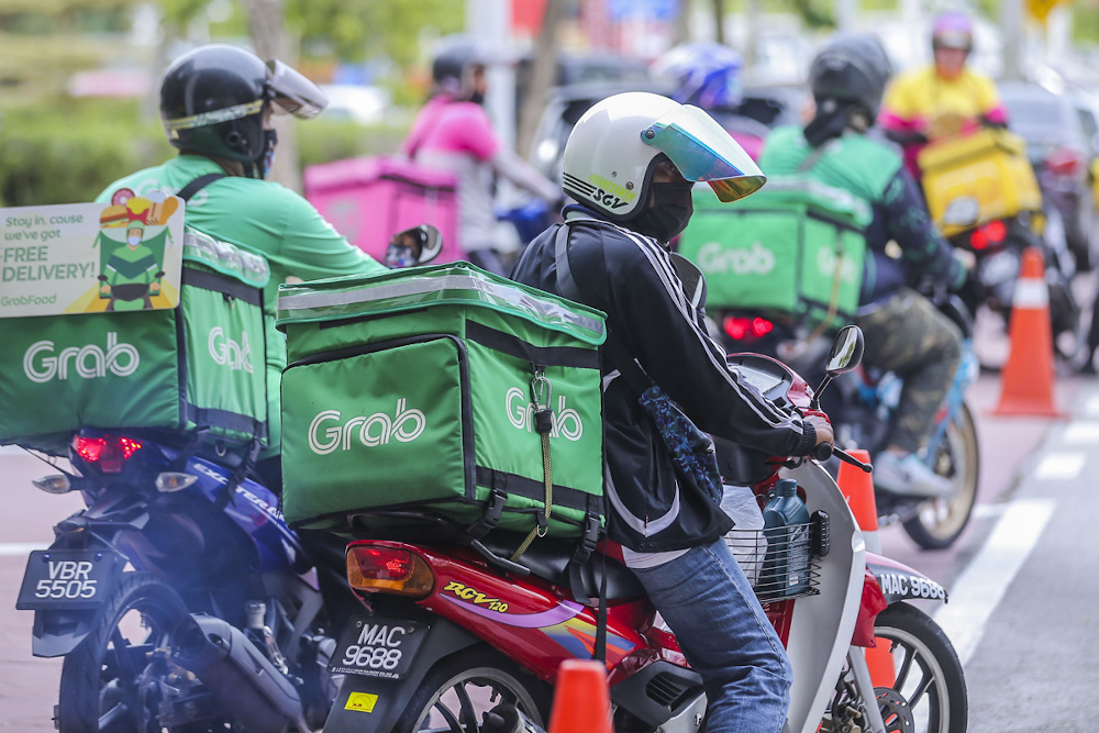 Malaysians are no strangers to ordering food from Grab by now. ― Picture by Hari Anggara