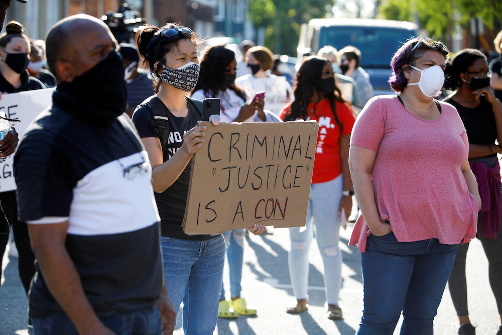 Protesters carry placards after family members were shown body camera footage of a deputy Sheriff shooting and killing Black suspect Andrew Brown Jr. last week, in Elizabeth City, North Carolina April 26, 2021. u00e2u20acu201d Reuters pic