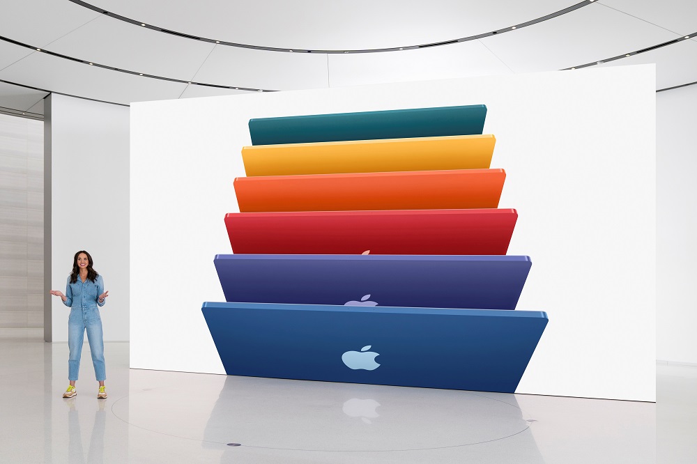 Appleu00e2u20acu2122s Colleen Novielli showcases the new iMac lineup featuring an array of colours, in this still image from the keynote video of a special event at Apple Park in Cupertino, California released April 20, 2021. u00e2u20acu2022 Apple Inc/Handout via Reuters
