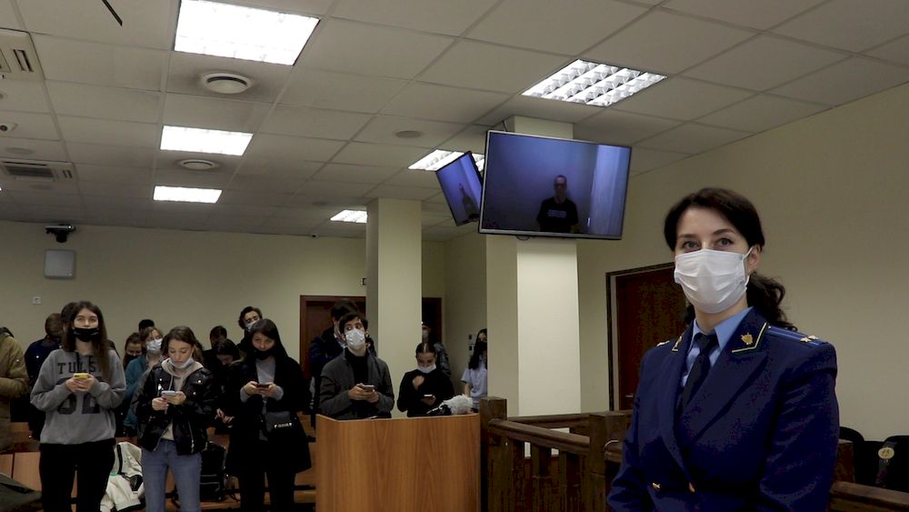 Alexei Navalny is seen on screens via video link during a hearing to consider an appeal against an earlier court decision that found him guilty of slandering a Russian World War Two veteran, in Moscow, April 29, 2021. u00e2u20acu201d Handout pic via Reuters