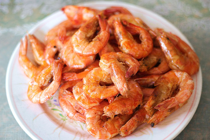 A full platter of tomato chilli prawns that will keep you “ha-ha” happy.