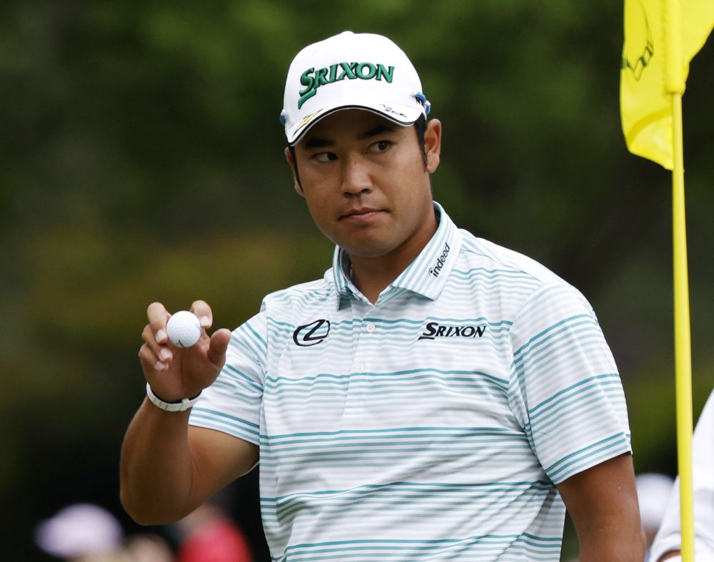 Japan’s Hideki Matsuyama acknowledges the crowd after holing his eagle putt on the 15th green during the third round at the Augusta National Golf Club, Georgia April 10, 2021. — Reuters pic