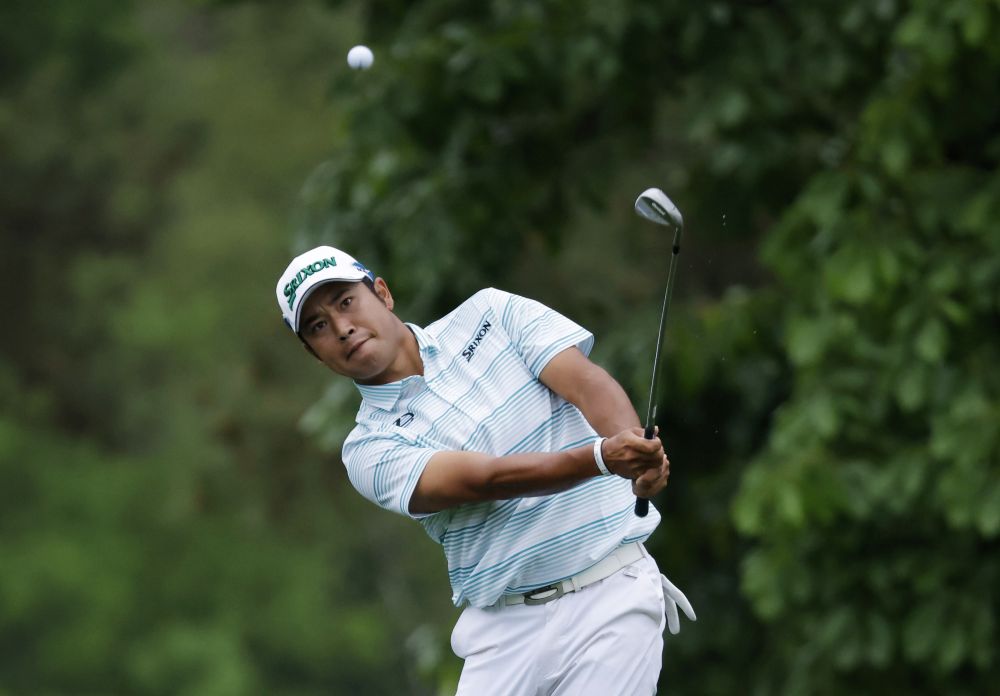 Japan’s Hideki Matsuyama chips onto the 14th green during the third round at the Augusta National Golf Club, Georgia April 10, 2021. — Reuters pic