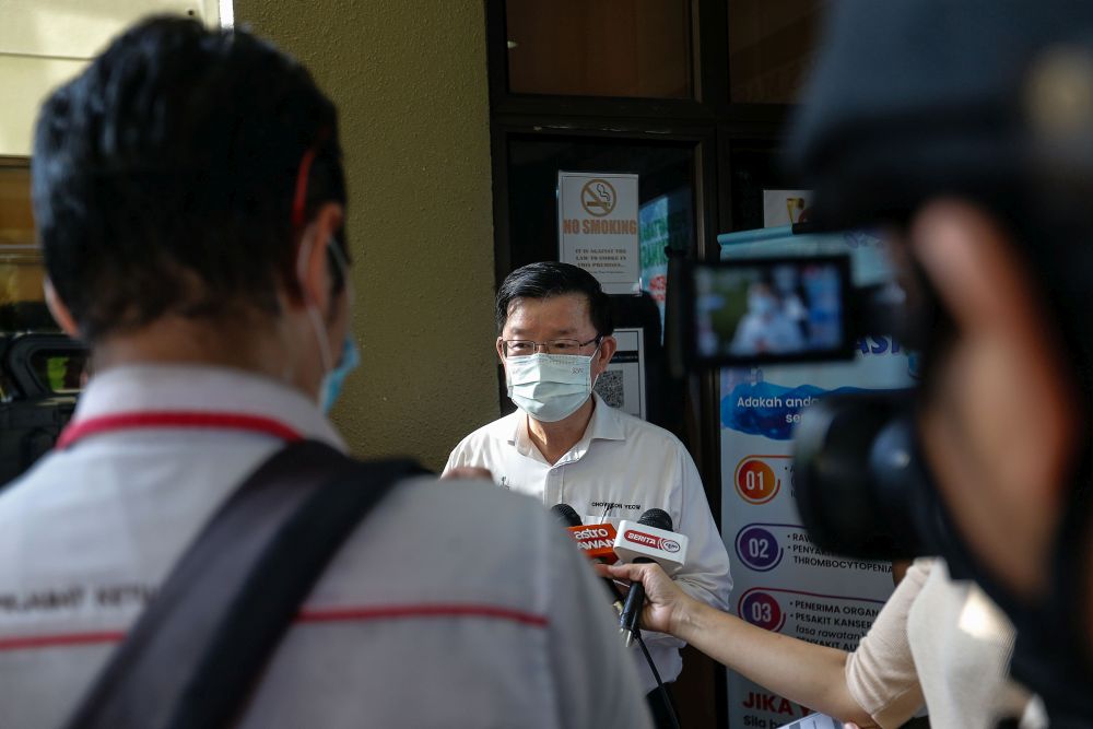 Penang Chief Minister Chow Kon Yeow speaks to reporters during a visit to the Covid-19 vaccination centre at the Caring Society Complex, George Town April 19, 2021. — Picture by Sayuti Zainudin