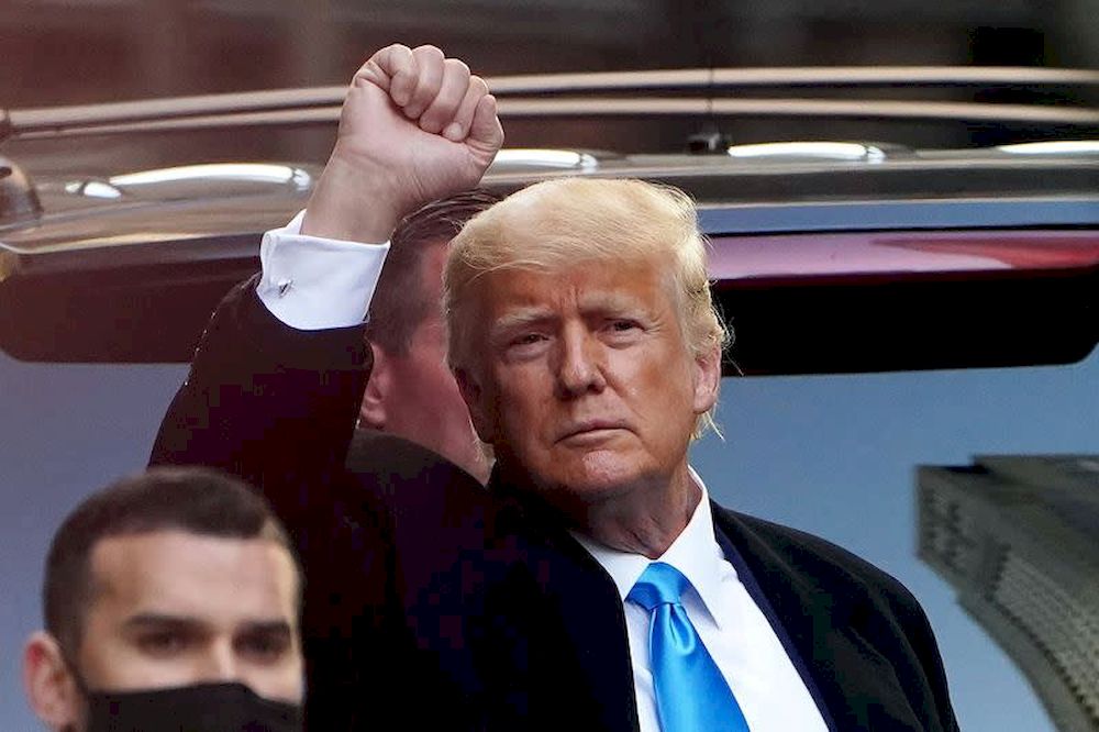 Former US President Donald Trump acknowledges people as he gets in his SUV outside Trump Tower in the Manhattan borough of New York City, New York, US, March 9, 2021. u00e2u20acu201d Reuters pic
