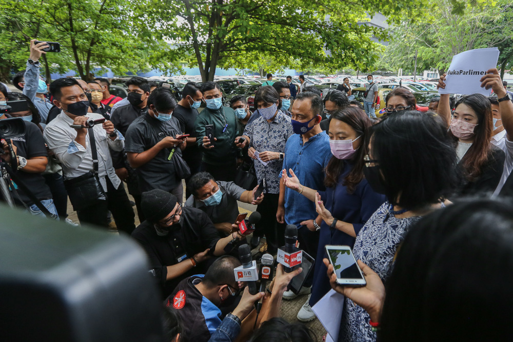 (From left) Ambiga Sereenavasan, Maszlee Malik, Hannah Yeoh and Maria Chin Abdullah speak to reporters outside the Dang Wangi District Police headquarters in Kuala Lumpur April 4, 2021. u00e2u20acu201d Picture by Yusof Mat Isa