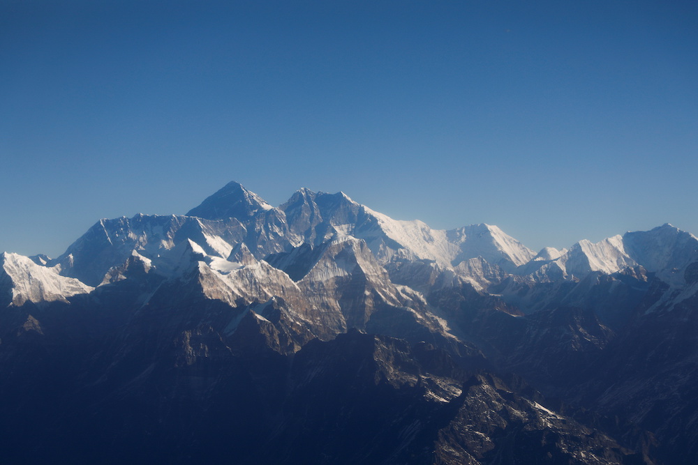 Mount Everest, the world highest peak, and other peaks of the Himalayan range are seen through an aircraft window during a mountain flight from Kathmandu, Nepal January 15, 2020. u00e2u20acu2022 Reuters picnn